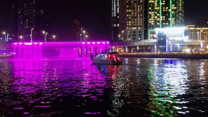 Dubai water canal waterfalls details pricing and location timing
